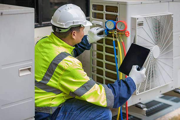 Professional Air Conditioning Repair technician working in Kaneville, IL